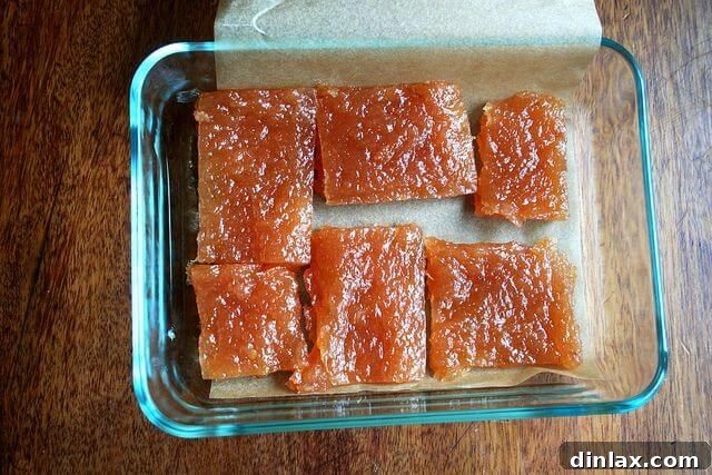 Homemade quince paste cut into squares and triangles