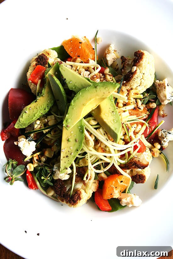 A Wholesome and Delicious Salad Creation A beautifully composed healthy salad featuring fresh vegetables and a vibrant dressing, perfect for a balanced meal.