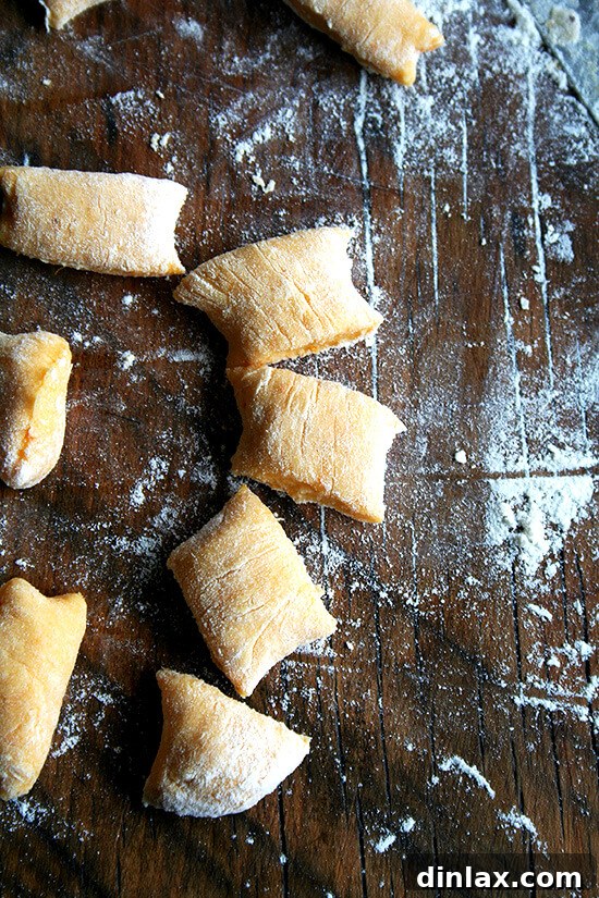 Freshly cut gnocchi pieces before shaping with a fork.