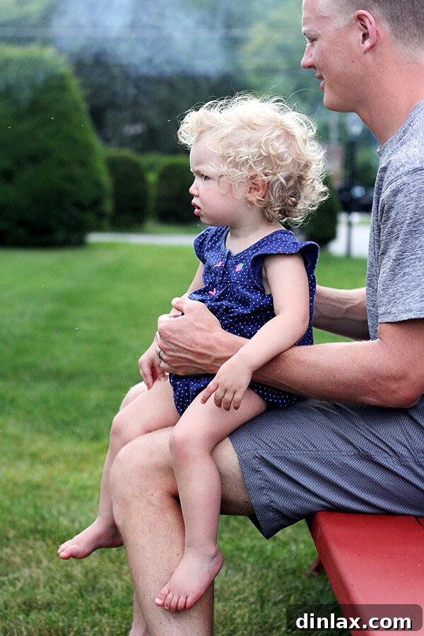 Ben and Tig at dinner Ben sharing a tender, loving moment with Tig during a family meal, creating precious and heartwarming memories.