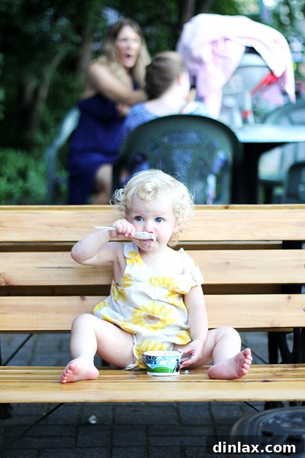 The Queen of American Lakes 12 Baby Tig thoroughly enjoying her first ice cream cone, a sweet moment of pure discovery and happiness.