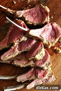 Delicious mustard-crusted rack of lamb, golden and perfectly roasted, a simple yet elegant meal.