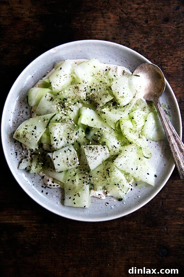 This cucumber salad with tahini-yogurt sauce essentially is a no-cook meal, a refreshing salad to make good use of those cool summer cucs, which might just be arriving in droves. I serve it along side broiled slices of ciabatta. Yum. // alexandracooks.com
