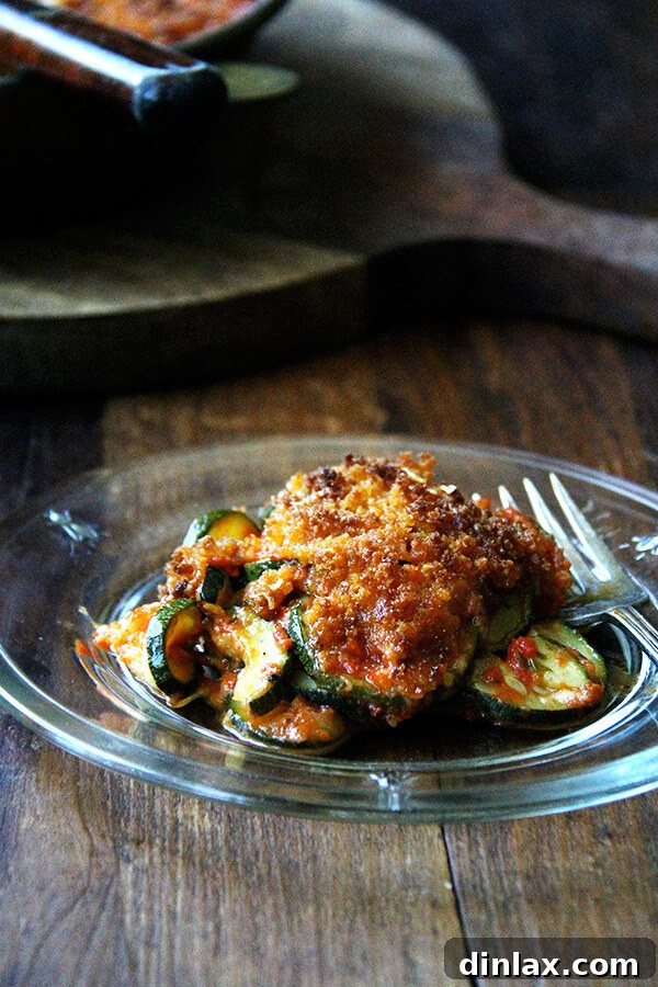 Delicious baked zucchini parmesan gratin, golden and bubbling, ready to serve.