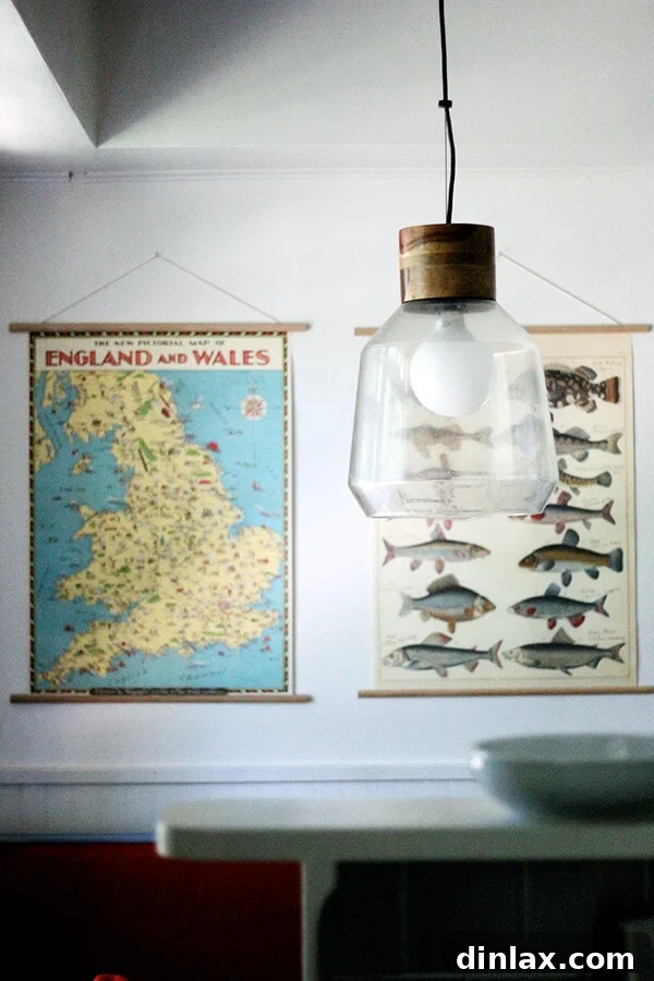 Multiple Cavallini posters displayed together as a gallery wall.