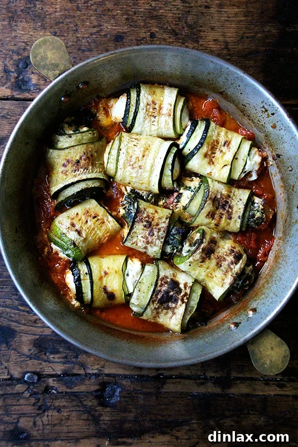 Freshly baked zucchini involtini, hot and bubbling from the oven, ready to serve.
