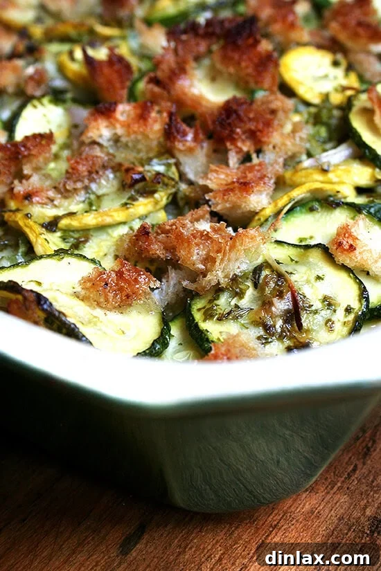 Final Summer Squash Gratin Dish A close-up of the finished Summer Squash Gratin, highlighting the crispy topping and tender squash.