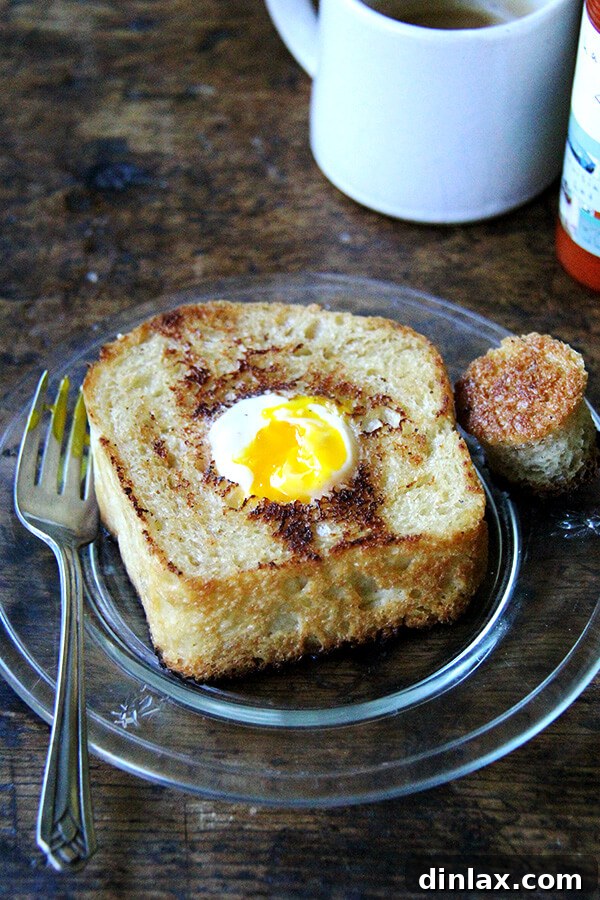 Sweet and Salty Marzipan Mandel Bread 15 Close-up of Egg in a Hole, highlighting its comforting appeal, a recipe from Molly on the Range.