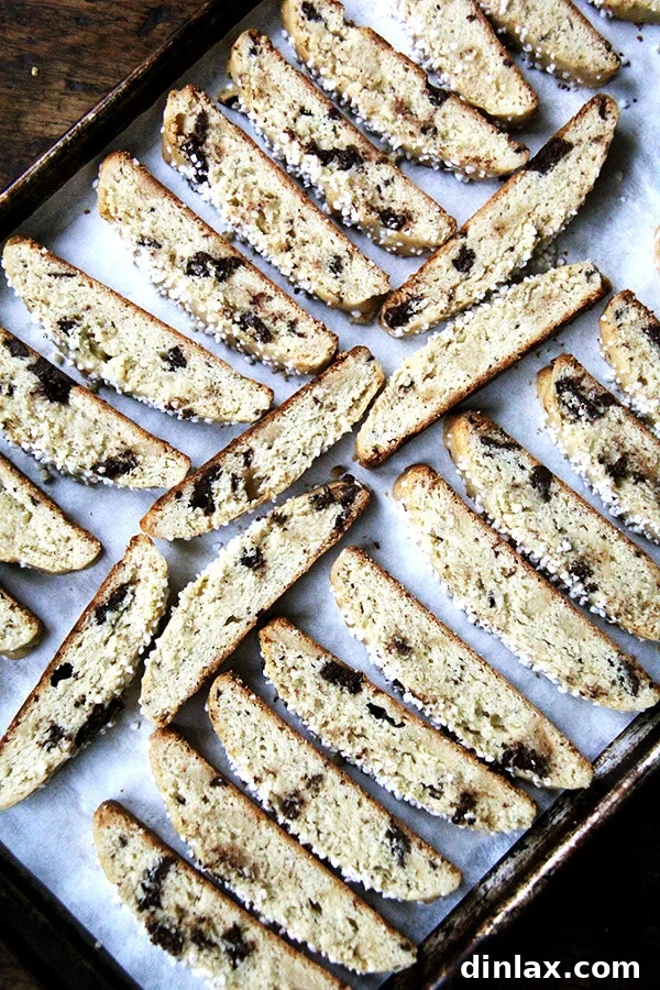 Sweet and Salty Marzipan Mandel Bread 8 Just-baked Mandel bread with chocolate and pearl sugar, cooling on a rack.