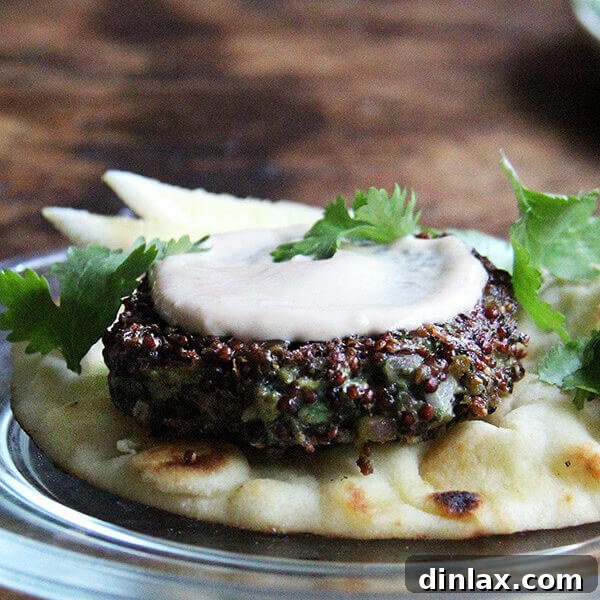 A crispy quinoa cake with tahini sauce.