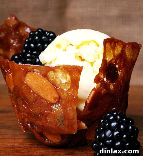 Rich and creamy homemade Crème Fraîche Ice Cream, garnished with fresh berries.