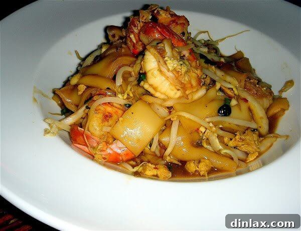 Continental's Rad Na Thai with Shrimp, a delectable stir-fried noodle dish.