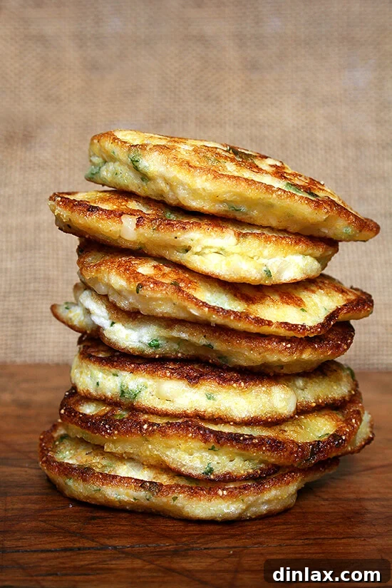 The initial batch of corn pancakes, light and fluffy due to whipped egg whites, before the recipe was adjusted to achieve a true fritter texture.