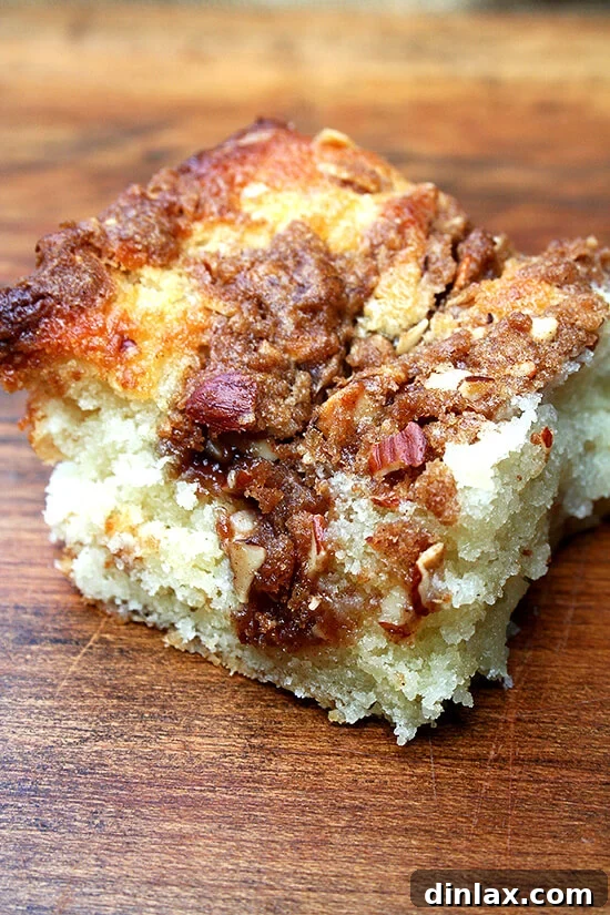 Classic Coffee Cake with Streusel Topping A golden-brown classic coffee cake with a generous streusel topping, perfect with a cup of black coffee.