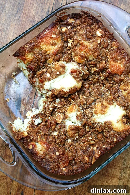 Freshly Baked Coffee Cake Cooling A perfectly baked coffee cake cooling on a wire rack, steam gently rising.