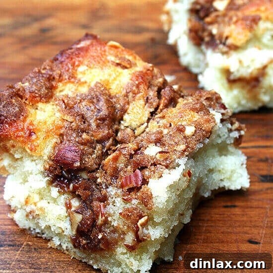 A classic coffee cake with a beautiful streusel swirl, ready to be served.