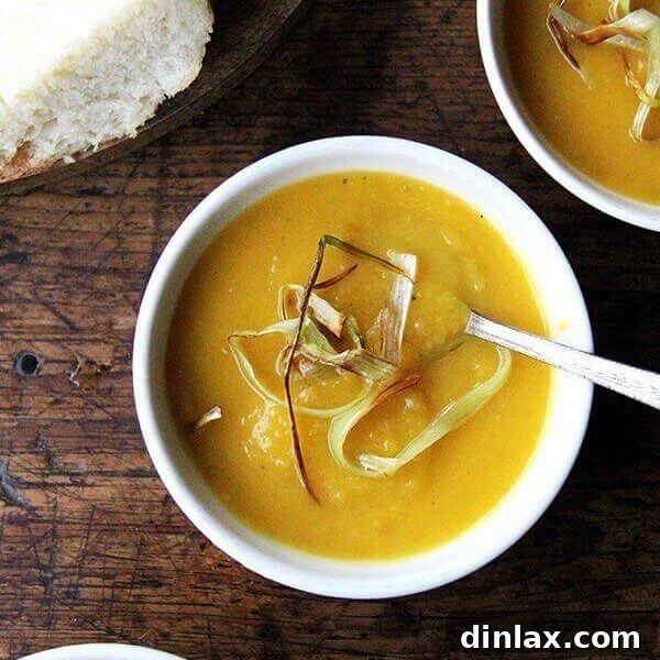 A bowl of Slow cooker butternut squash soup with apple and coconut milk.