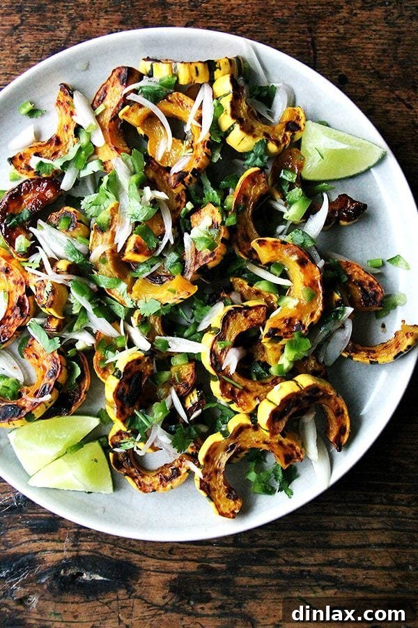 Roasted delicata squash with chilies, lime, and cilantro, beautifully plated.
