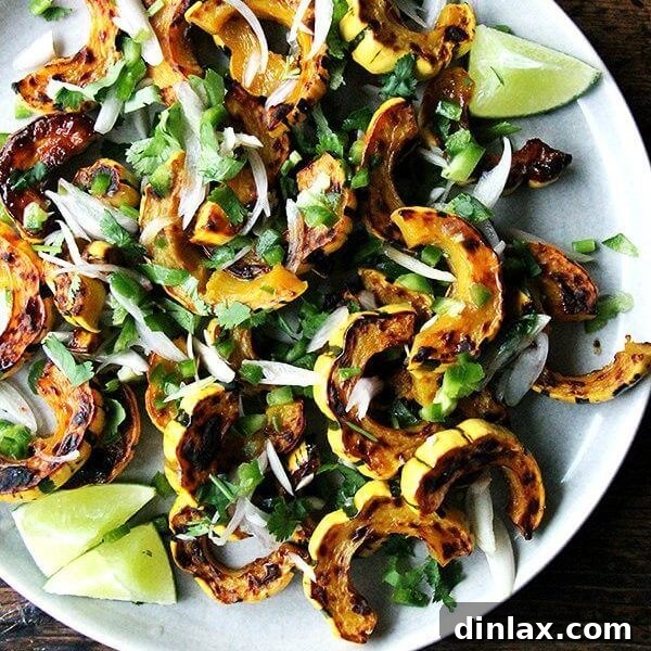 Beautifully roasted delicata squash slices with a vibrant dressing.
