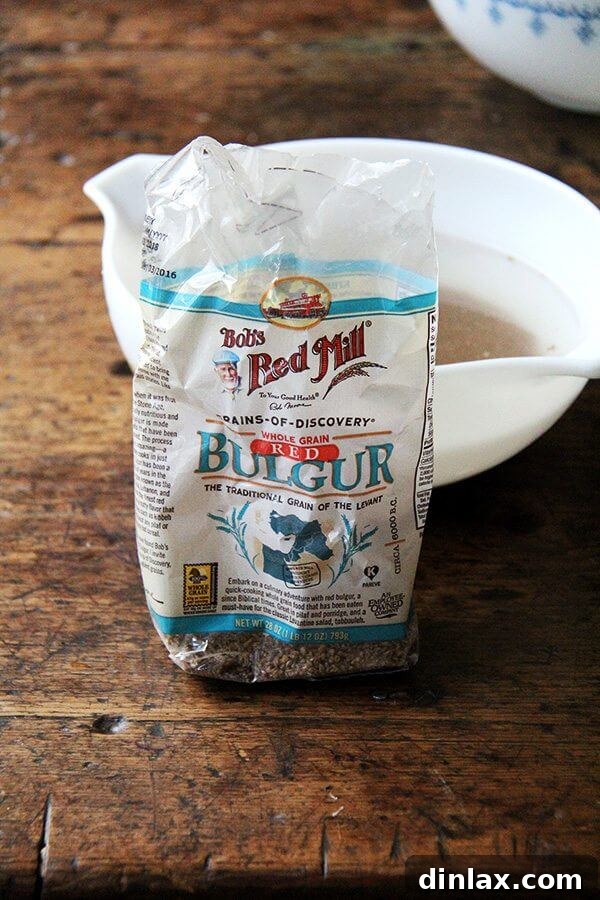 Jeweled Fall Tabbouleh 2 Close-up of vibrant red bulgur, the hearty and healthy base for Fall Tabbouleh.