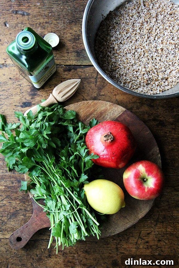 Jeweled Fall Tabbouleh 3 Fresh ingredients for Fall Tabbouleh: bulgur, parsley, apple, red onion, walnuts, and pomegranates.