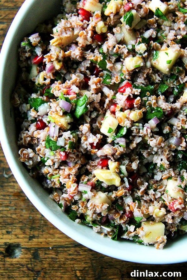 Jeweled Fall Tabbouleh 5 A bowl of freshly prepared Fall Tabbouleh, bright and flavorful, ready to be enjoyed.