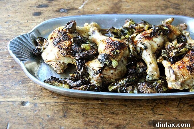 Sheet Pan Balsamic Chicken and Roasted Brussels Sprouts 3 A serving platter showcasing perfectly roasted sheet pan chicken and caramelized Brussels sprouts, glistening with balsamic glaze.