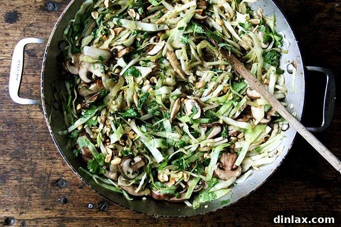 Raw ingredients for Cabbage Pad Thai-ish: sliced cabbage, mushrooms, and jalapeño.