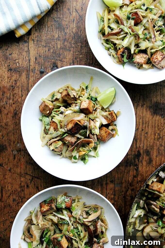 Finished Cabbage Pad Thai-ish dish, ready to be served, with a rich, glossy sauce.