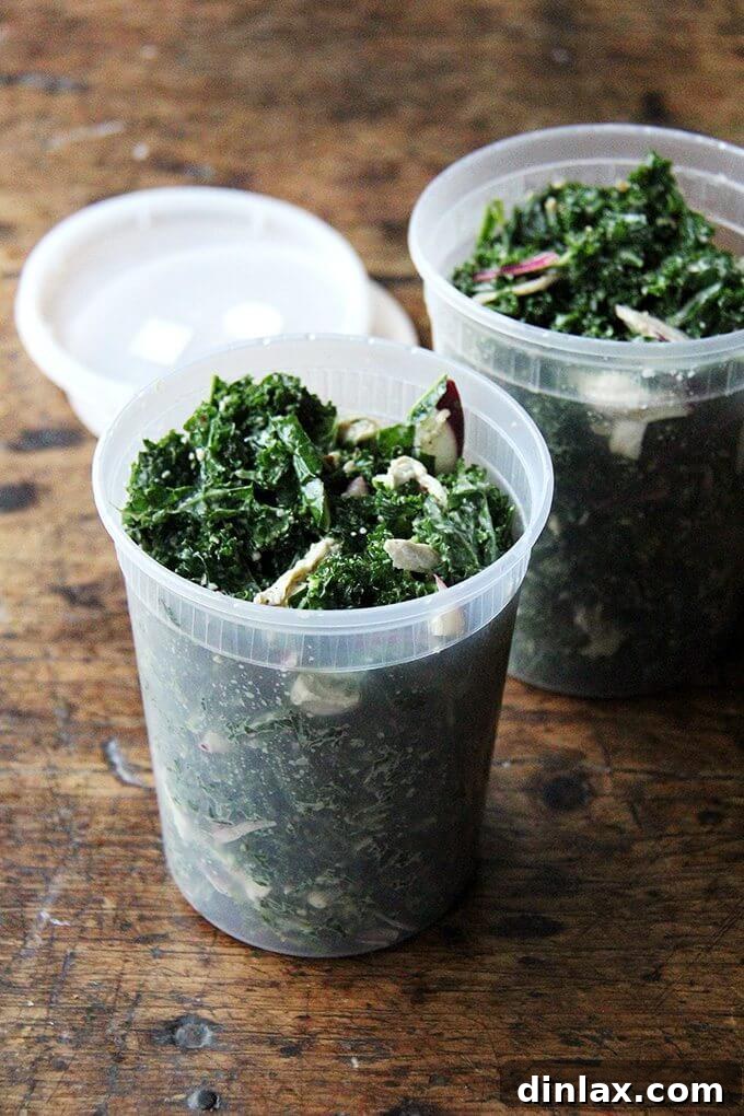 Vegan kale Caesar salad served with slices of cooked chicken, showcasing a versatile and hearty meal option.