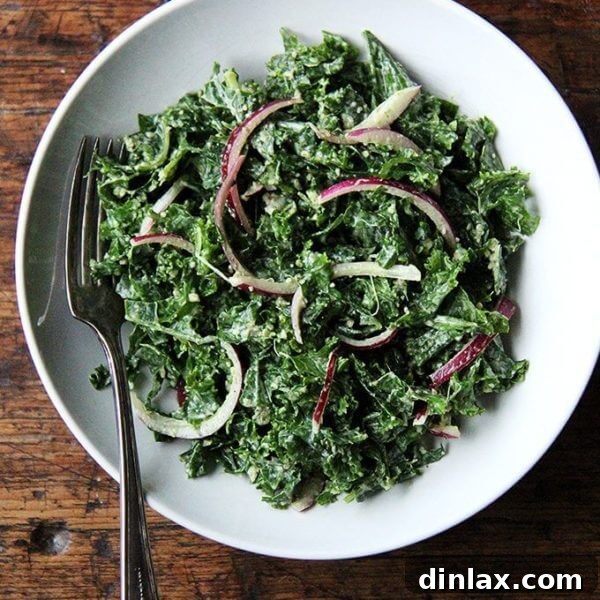 The ultimate vegan kale Caesar salad, with a rich, lemony dressing, tender massaged kale, quick-pickled onions, and savory toasted pumpkin seeds.