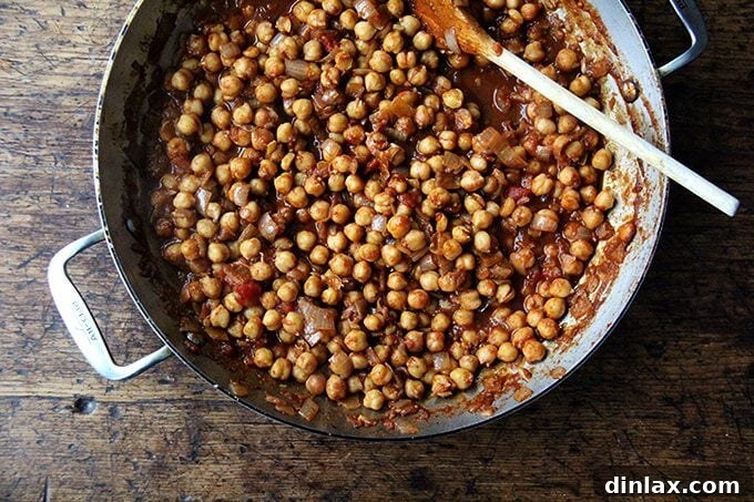 Spiced Chickpea Fiesta Bowls 3 A sauté pan with chickpea taco filling.