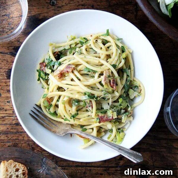 Bucatini Carbonara with Leeks, Lemon, and Bacon, a delightful and easy recipe perfect for a romantic Valentine's Day dinner.