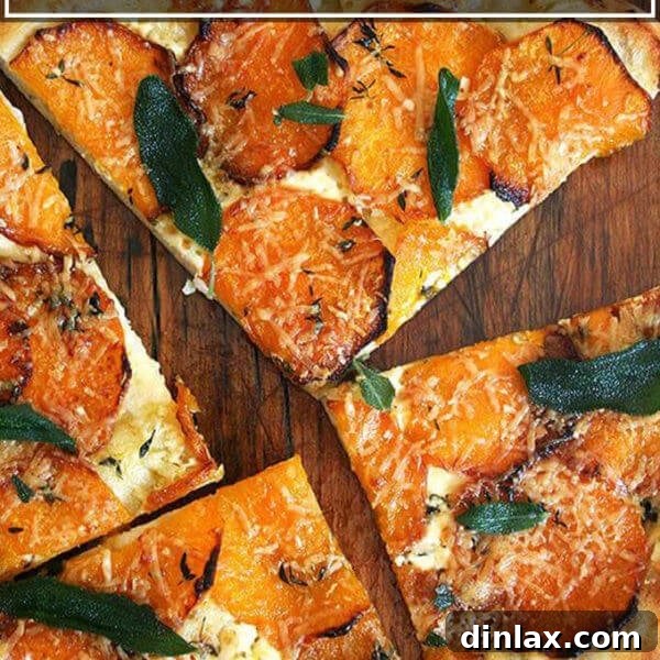 A butternut squash and crispy sage pizza cut into quarters, showcasing its delicious toppings and golden crust.