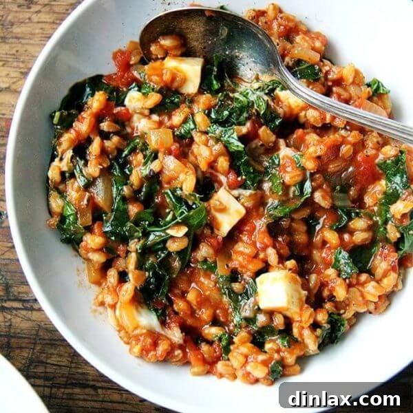 Delicious one-pot Farro Risotto with vibrant kale and tangy feta cheese, perfect for a healthy and satisfying meal.