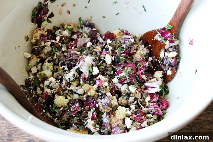 Detail shot of the salad, showing the creamy goat cheese and crunchy walnuts.
