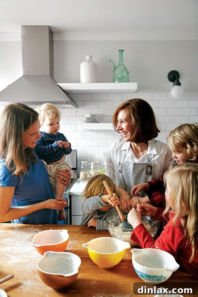 Multiple flowerpot bread loaves cooling on a wire rack, showcasing their uniform golden crust and charming shape.
