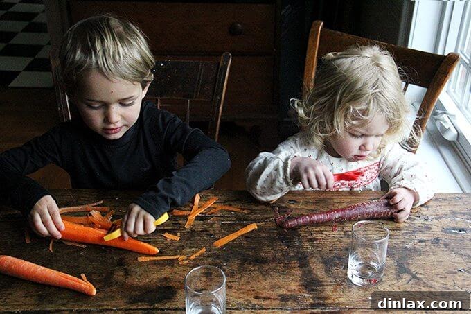 Mastering Skillet Pizza Perfection 15 Two kids peel carrots.