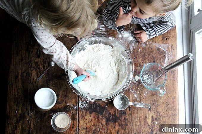 Mastering Skillet Pizza Perfection 5 Overhead shot of kids making pizza dough.