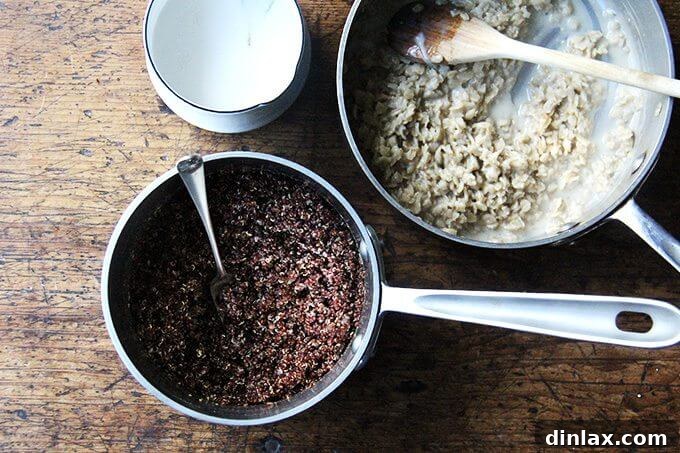 Cooking Oats and Quinoa: The Foundation for Your Ultimate Porridge Cooking rolled oats and fluffy pre-cooked quinoa in separate pots, preparing the essential grain base for a hearty and healthy breakfast porridge.