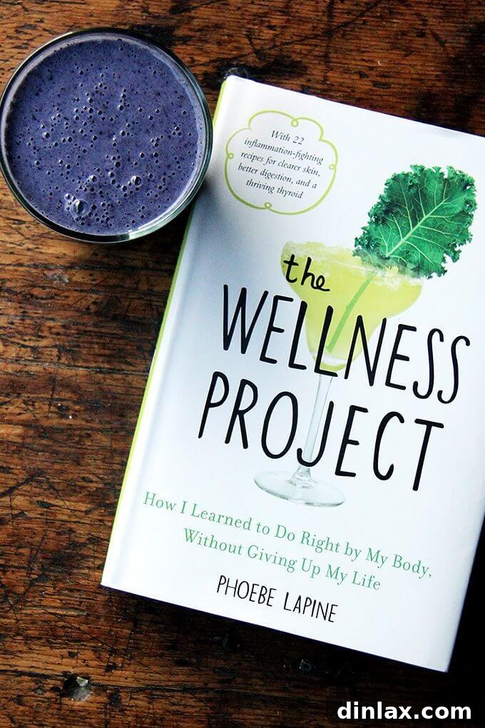 Blueberry Almond Vitality Smoothie 7 A single glass of blueberry-almond smoothie, viewed from a slightly different angle, showcasing its appealing texture.