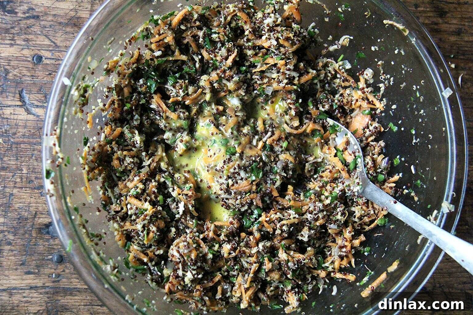 The complete veggie burger mixture, including beaten eggs, thoroughly combined in a bowl, ready to be formed into patties.