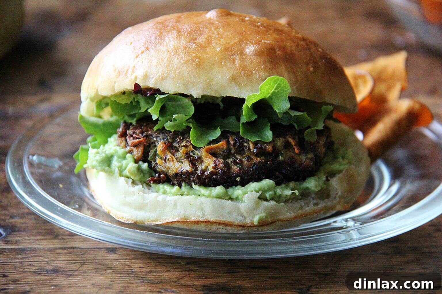 A delicious mushroom and quinoa veggie burger plated elegantly, ready to be enjoyed as a wholesome and flavorful meal.