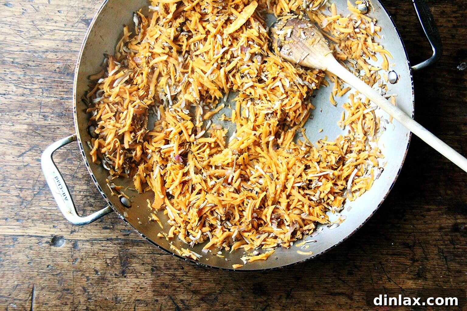 A closer view of the sautéed sweet potatoes and mushrooms, tender and lightly caramelized, forming the flavorful base for the veggie burger mixture.