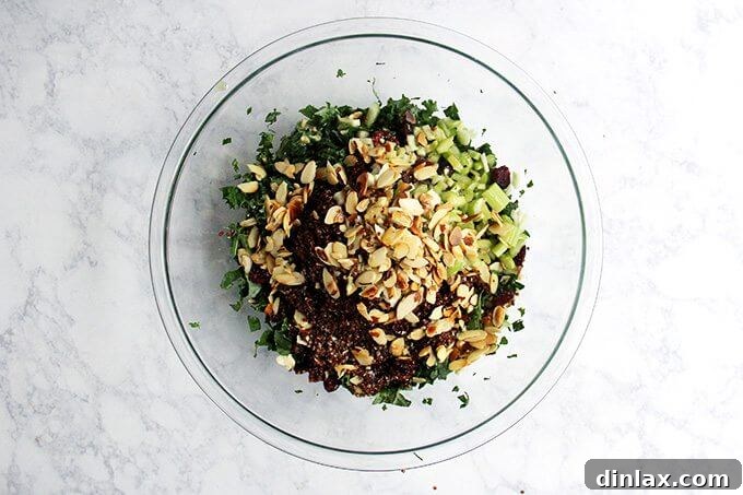 Love Real Food's Kale and Quinoa Salad 2 Close-up of the delicious Kale and Quinoa Salad, showcasing its vibrant ingredients and inviting textures.