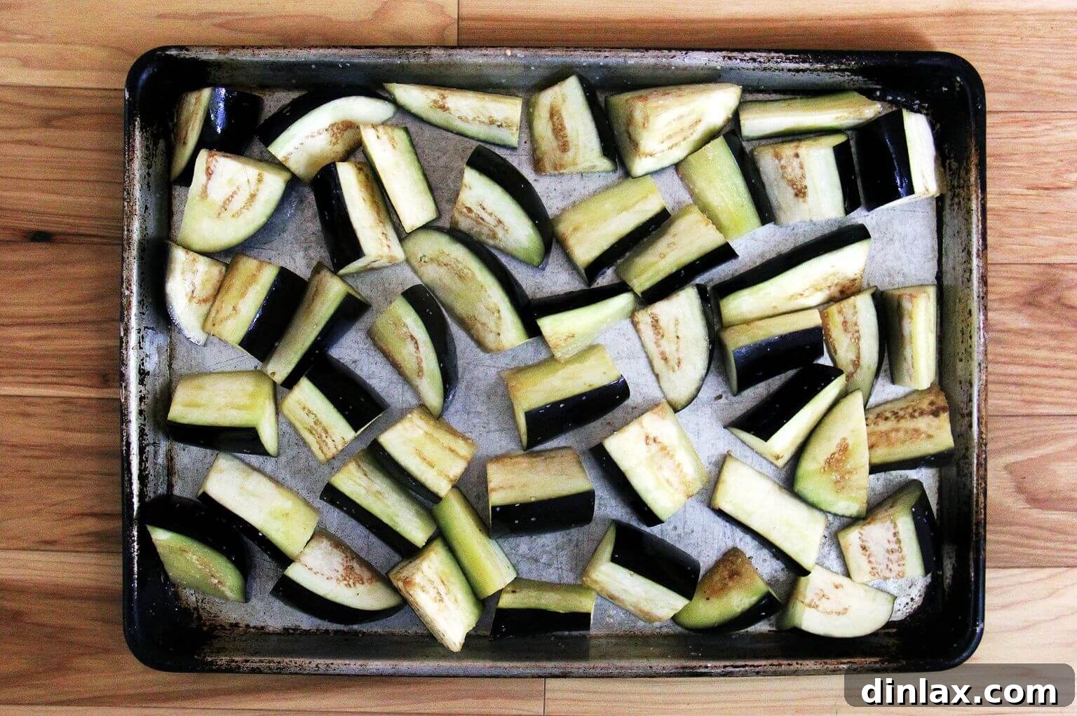 Chopped eggplant on a sheet pan
