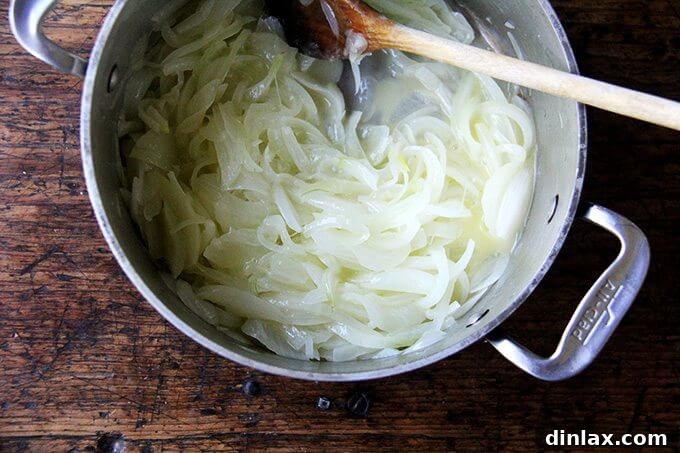 Marcella Hazan's Effortless Butter and Onion Tomato Sauce 7 A pot of sliced onions, cooking slowly until translucent and soft.