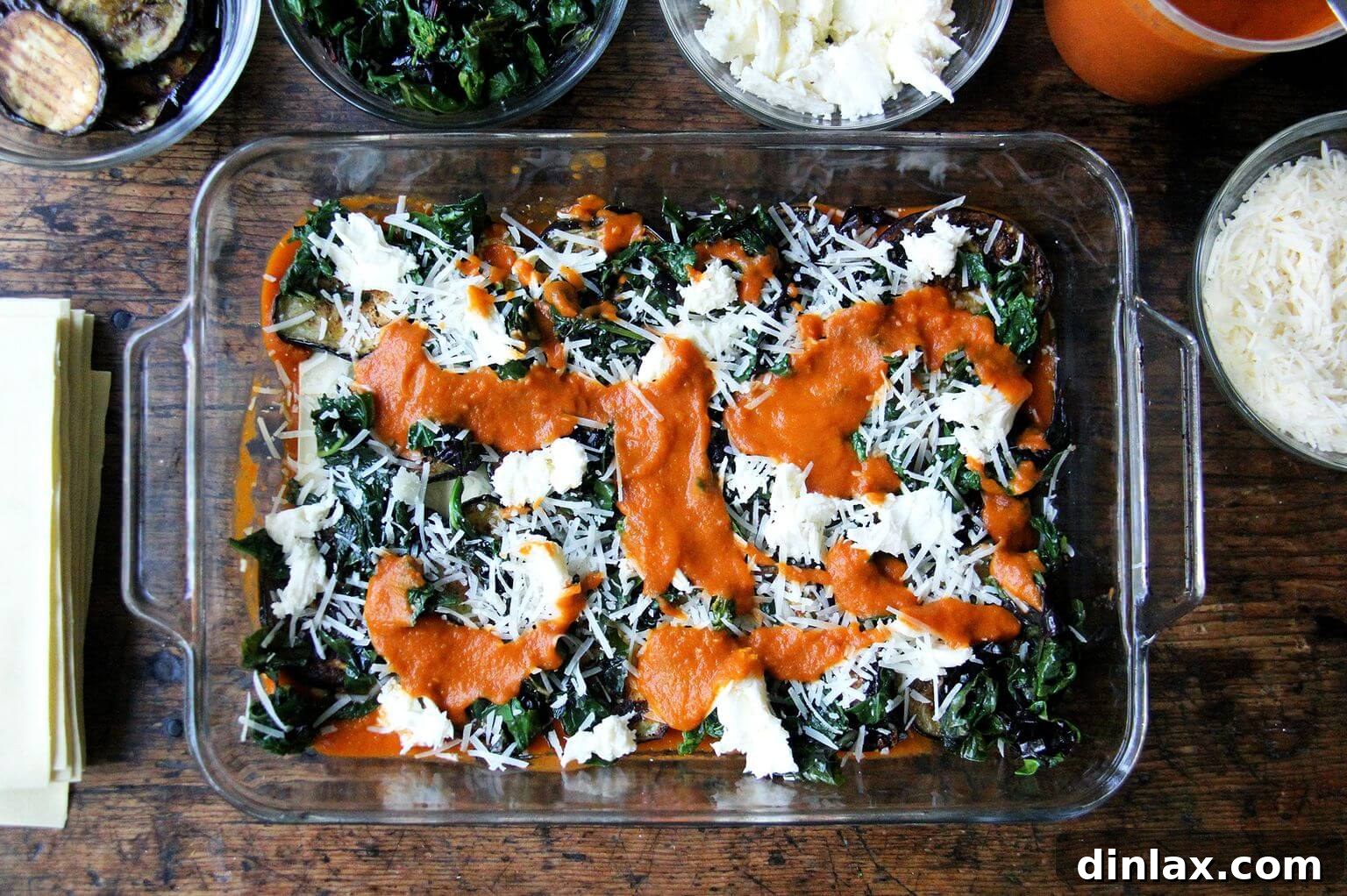 Another generous layer of rich tomato sauce for the lasagna.