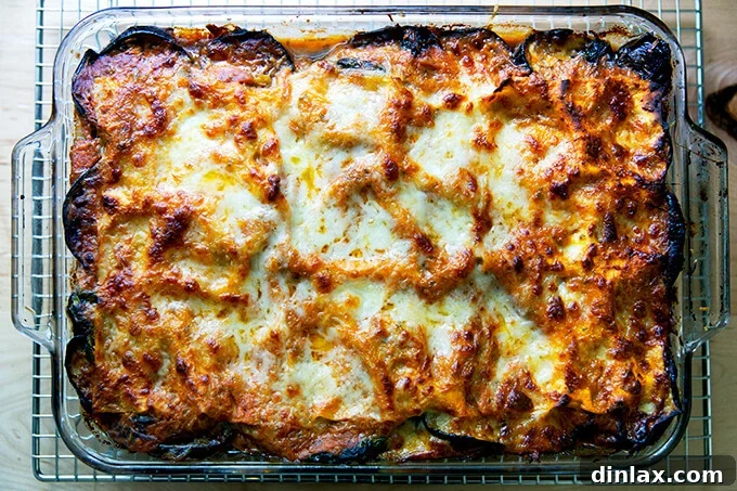 A hearty portion of roasted eggplant lasagna, cooling after baking.