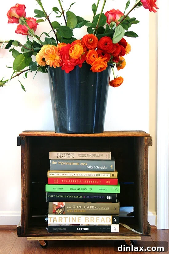 Looking for a purpose for old farm crates collecting dust in your basement? Try this farm crate bookshelf tutorial. It's not rocket science, will free up space in your home, and looks amazing! // alexandracooks.com Looking for a purpose for old farm crates collecting dust in your basement? Try this farm crate bookshelf tutorial. It's not rocket science, will free up space in your home, and looks amazing! // alexandracooks.com